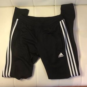 Adidas women’s track pants size XS.   Zippers at the ankles and zipper pockets.